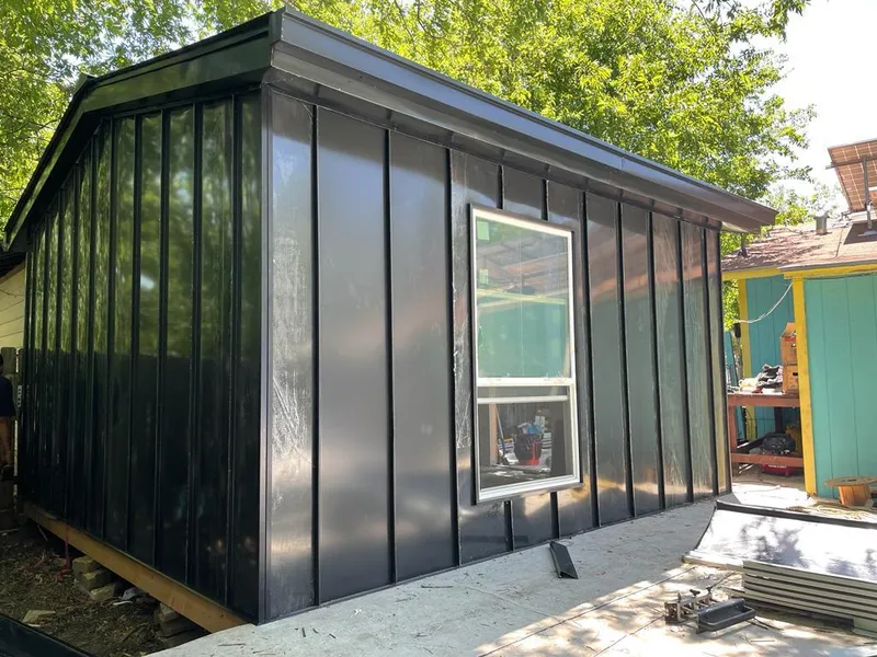 Black standing seam metal wall panels for Roof Inspection in Manasquan
